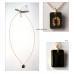 Little Luck Black & Gold Horseshoe Necklace